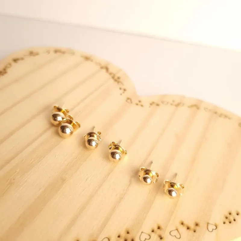 Brinco trio bolinhas