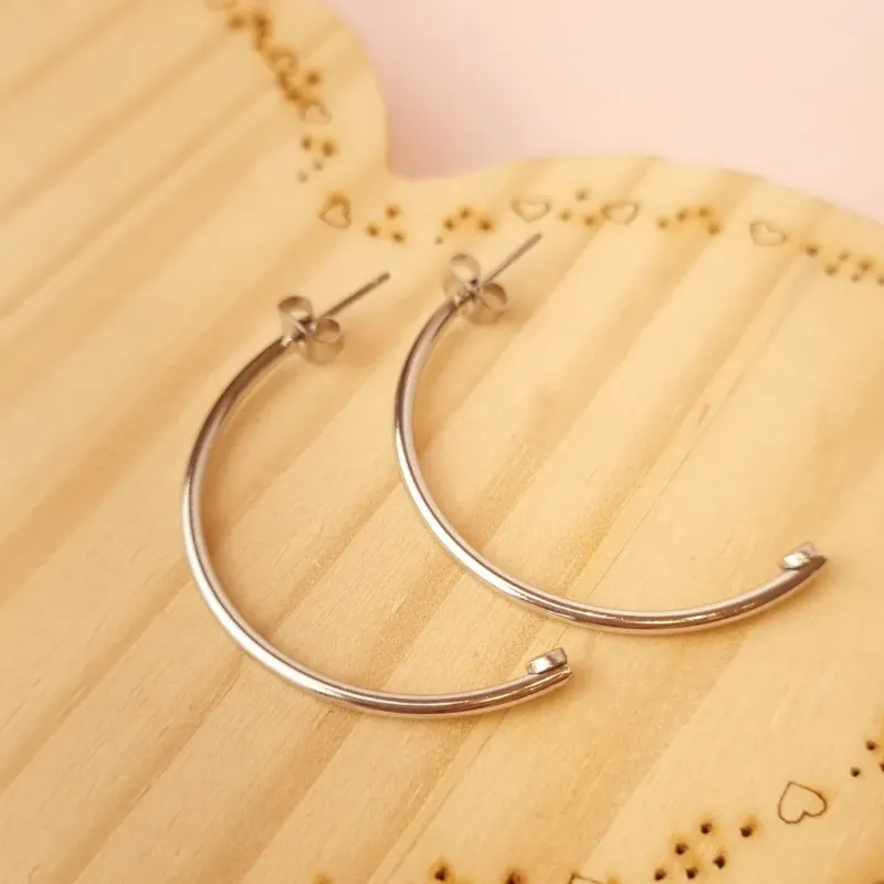 Brinco Steel Argola Meia Lua