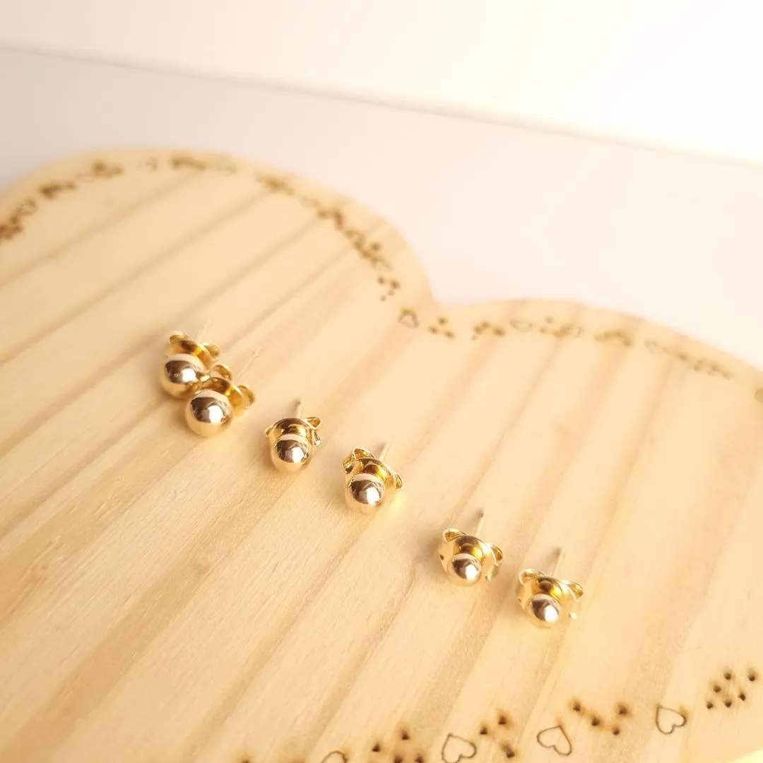 Brinco trio bolinhas