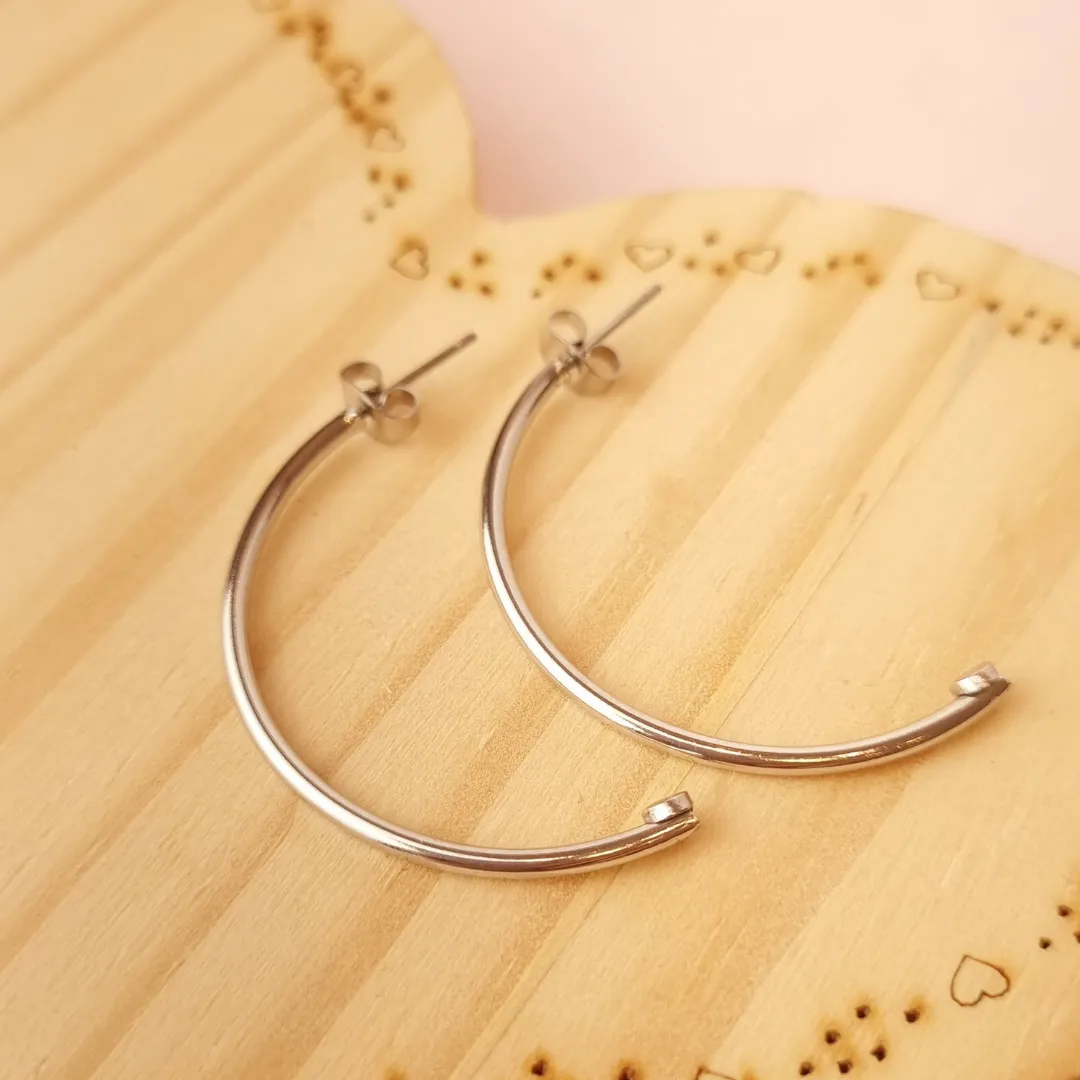 Brinco Steel Argola Meia Lua